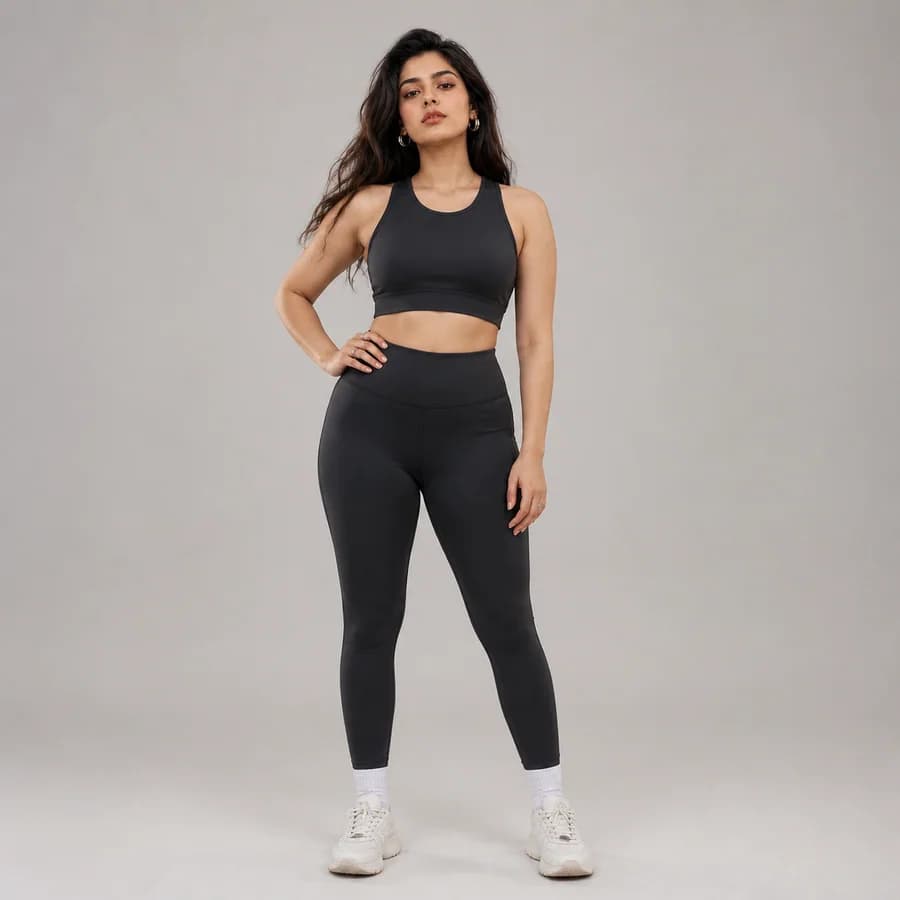 Woman modeling squat-proof black activewear leggings