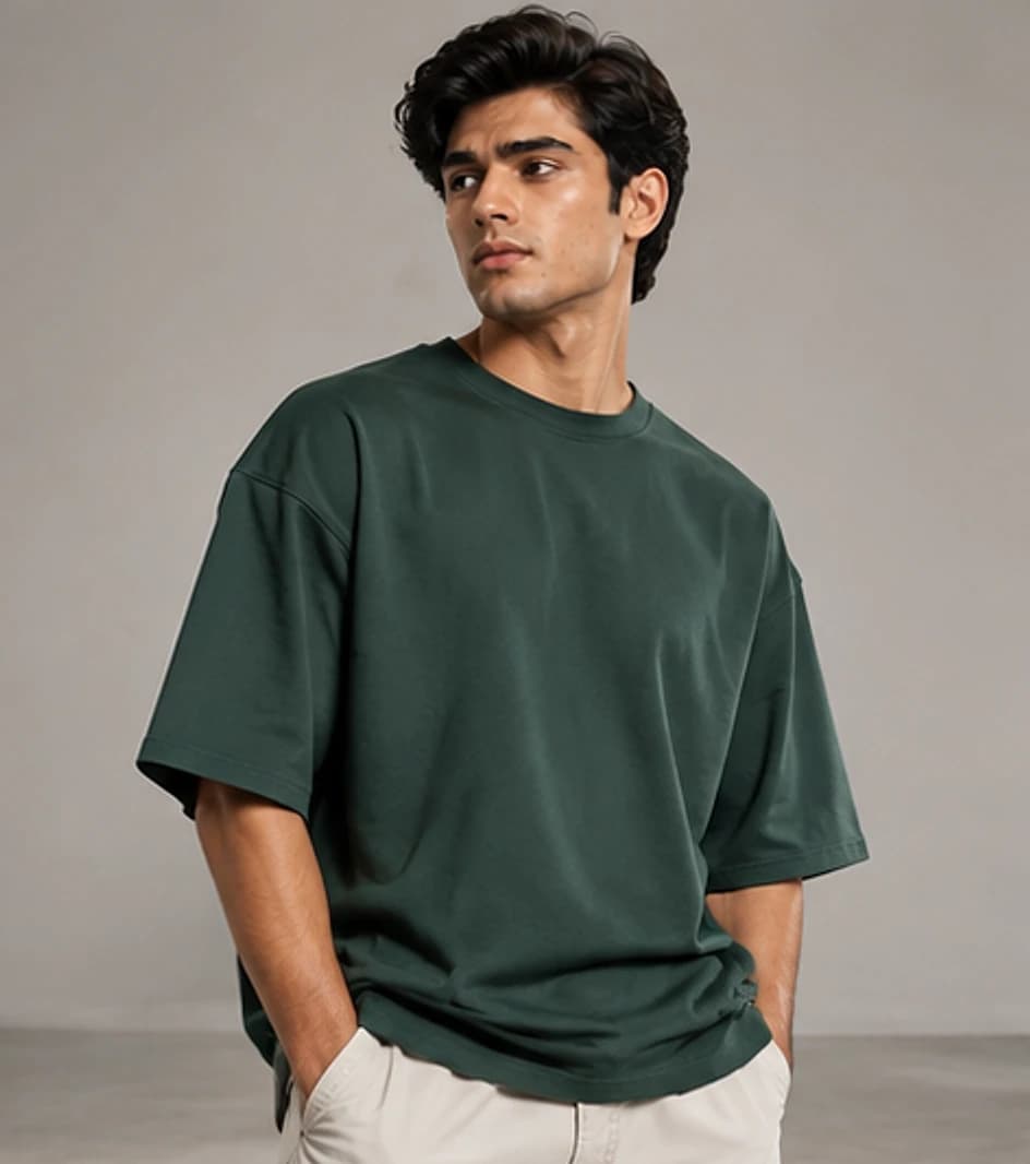 Model wearing a heavyweight washed-charcoal oversized t-shirt