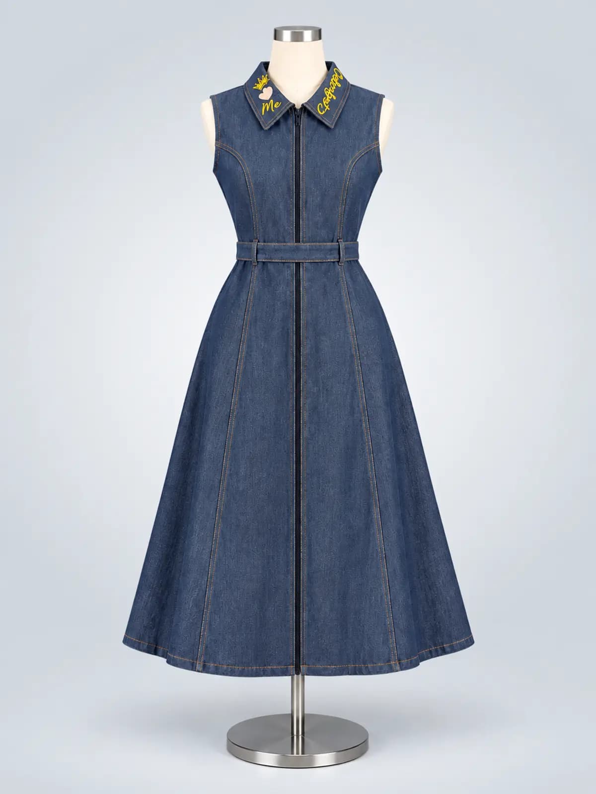 Blue sleeveless collared denim midi dress with a fitted waist and flared skirt on a mannequin