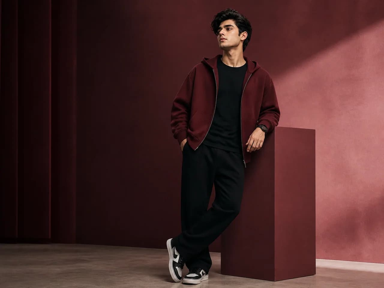 Male GenXport model wearing a plain oversized hoodie for Boutiques & Retailers
