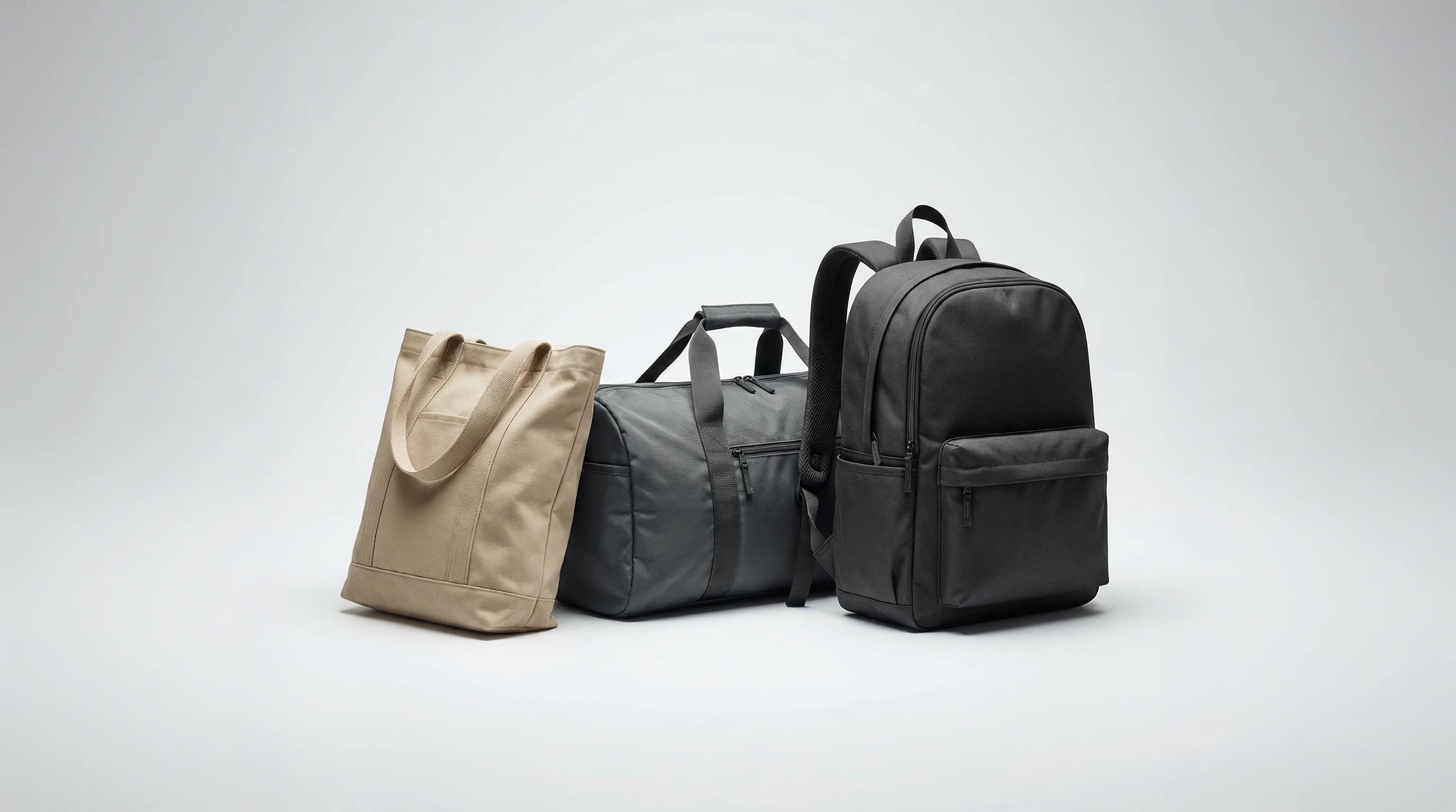 Travel-ready bags with charge-through port and trolley strap